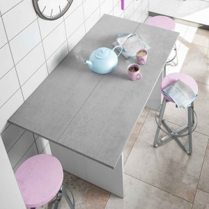 Mesa desplegable modelo Oggi, de color blanco artik y cemento.