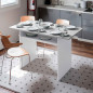 Mesa desplegable modelo Oggi, de color blanco artik y cemento.
